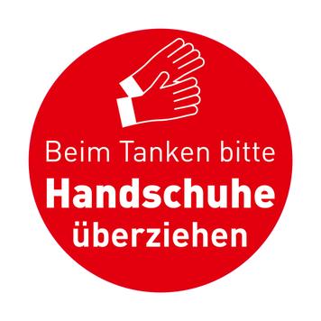 Klistermärke på Bensinstation "Bitte Handschuhe überziehen"